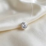 Lant pe fir transparent cu baza rotunda argint si bob swarovski