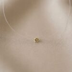 Lant pe fir transparent cu bobita swarovski (taietura briliant) auriu de 2,5 mm