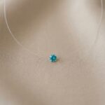 Lant pe fir transparent cu bobita swarovski (taietura briliant) turcoaz de 2,5 mm